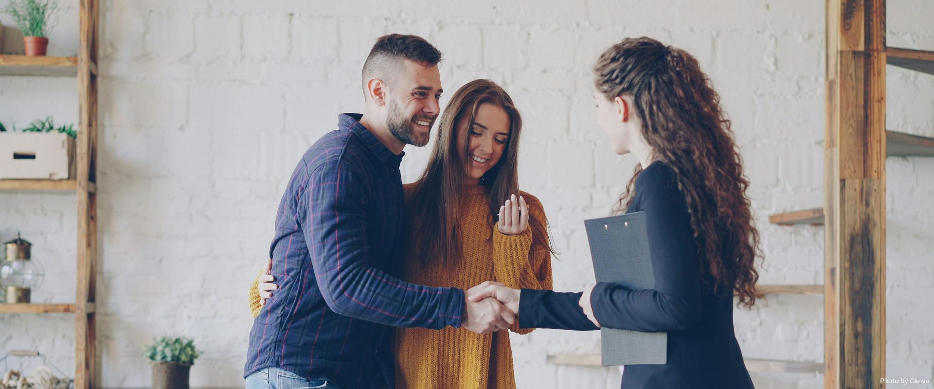 Couple closing deal with agent