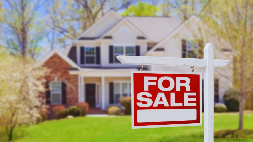 Home With For Sale Sign