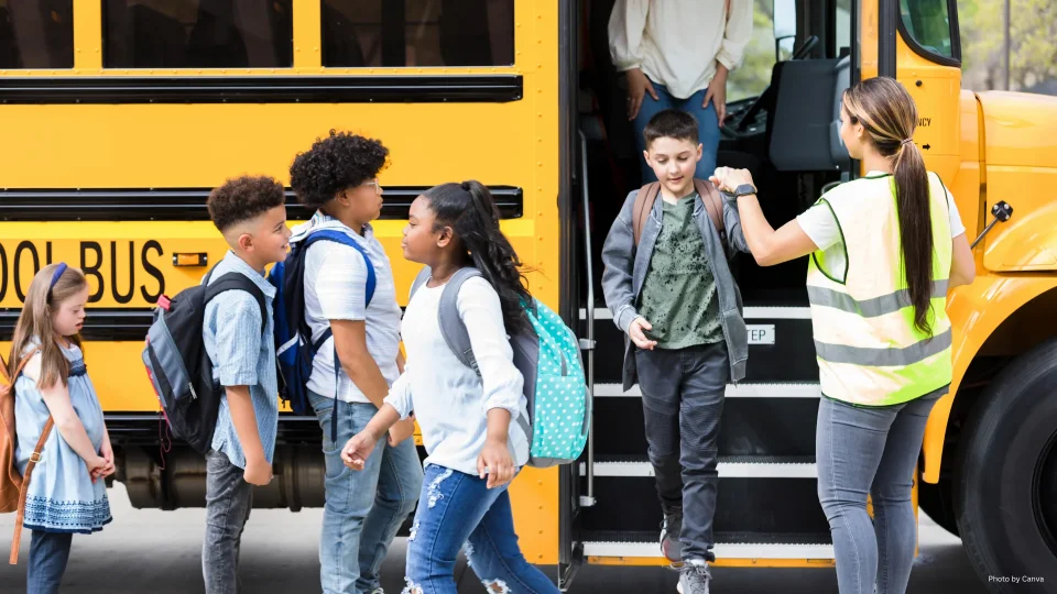 School Bus with students and transportation staff