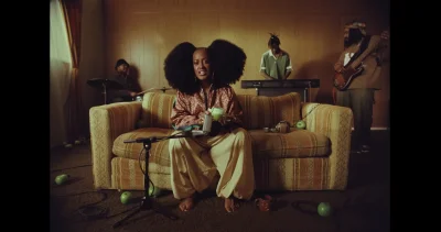 Brown Sugar in a Glass: Rapsody Pours the First Toast to D'Angelo