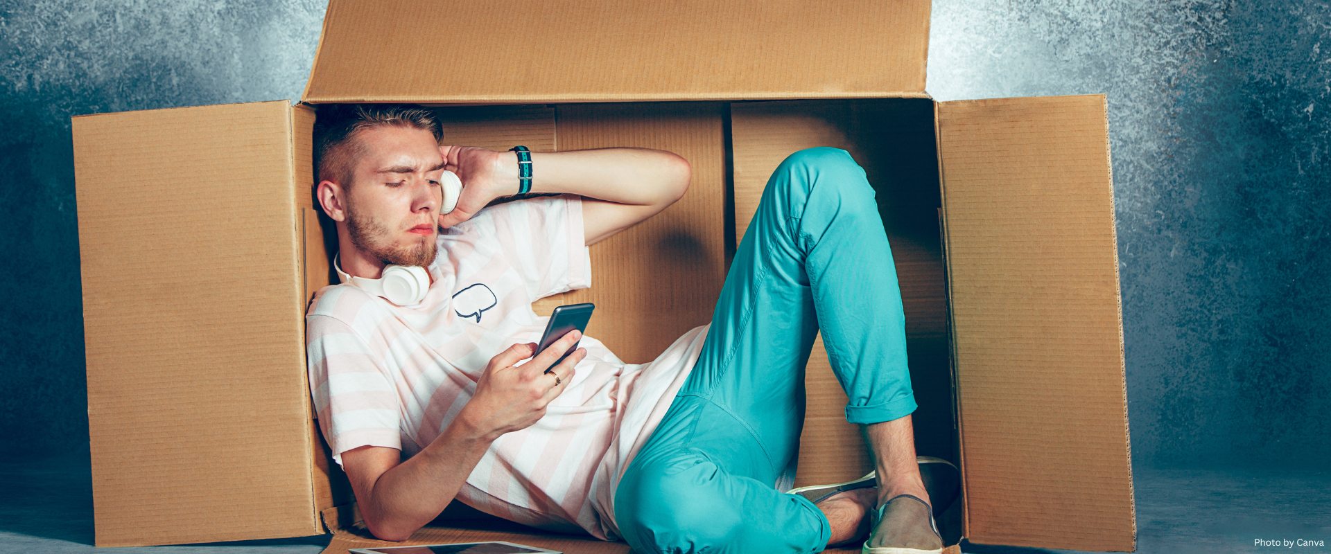 An Introvert Man Sitting inside a Box