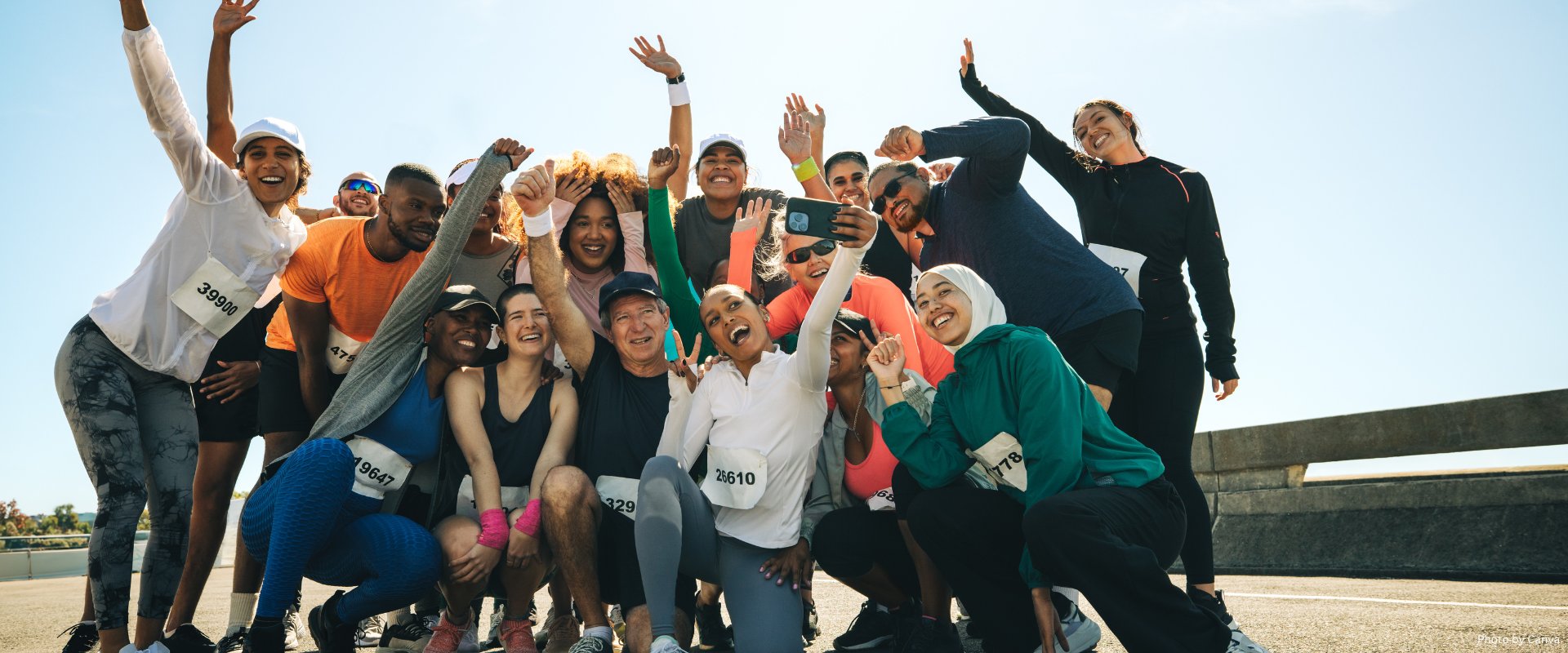 Running club group photo on an energetic race day