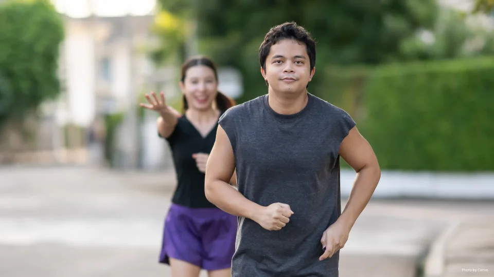 Couple running outdoor in nature for exercise
