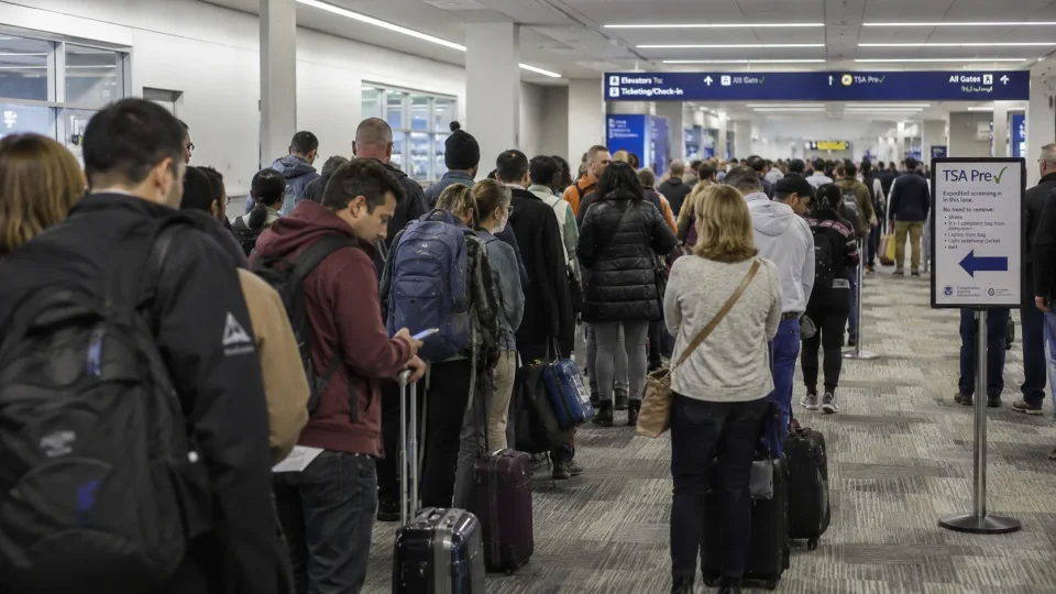 A busy airport security checkpoint