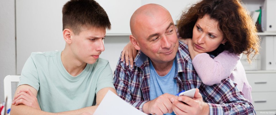 Family calculating finances