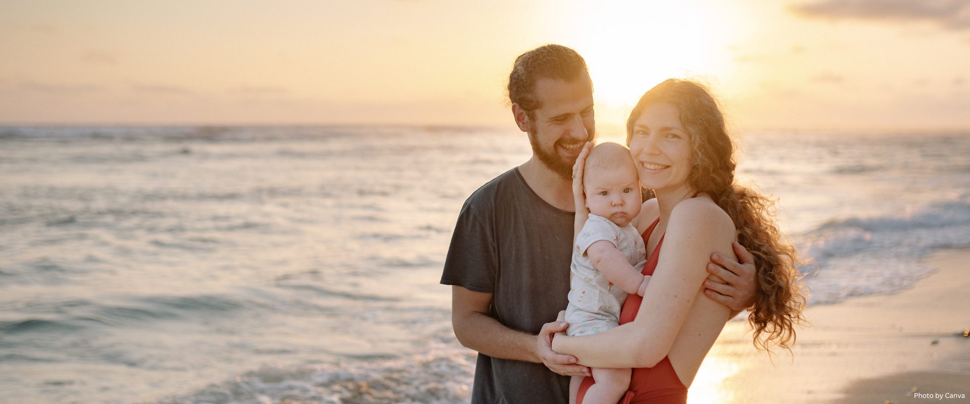 A Family Smiling at the Camera
