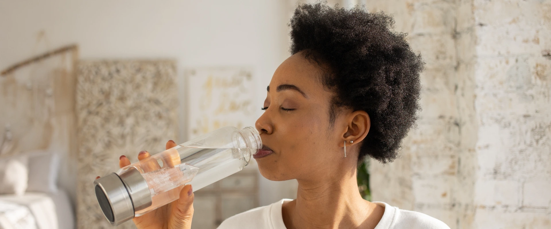 Black woman drinking water