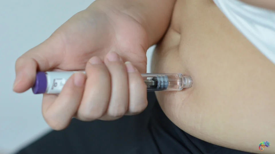 Hand Holding Weight Loss Injection Pen